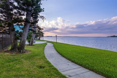 Live the small beach town lifestyle in this beautiful waterfront on The Dunedin Country Club in Florida - for sale on GolfHomes.com, golf home, golf lot