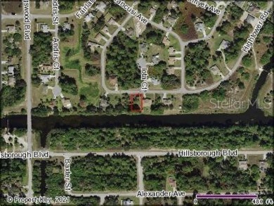 Beautiful waterfront lot on the Cocoplum Waterway, freshwater on Bobcat Trail Golf Club in Florida - for sale on GolfHomes.com, golf home, golf lot