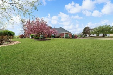 This stunning single-story brick ranch home offers breathtaking on Gold Creek Resort in Georgia - for sale on GolfHomes.com, golf home, golf lot