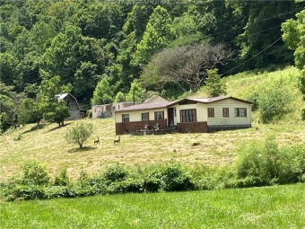 8+ Acres with barn, river and 2 trailers that need work.  One on Edgewood Country Club in West Virginia - for sale on GolfHomes.com, golf home, golf lot