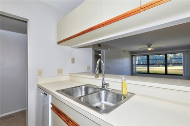 Amazing golf & lake views set the tone for this well-located on Vista Plantation Golf Club in Florida - for sale on GolfHomes.com, golf home, golf lot