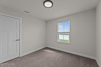 You will not want to miss this one. Located in one of Moyock's on Eagle Creek Golf Club and Grill in North Carolina - for sale on GolfHomes.com, golf home, golf lot