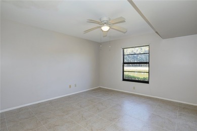 Amazing golf & lake views set the tone for this well-located on Vista Plantation Golf Club in Florida - for sale on GolfHomes.com, golf home, golf lot