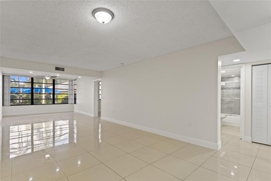 Beautiful 2-bedroom, 2-bathroom condo with a versatile bonus on Pine Island Ridge Country Club in Florida - for sale on GolfHomes.com, golf home, golf lot