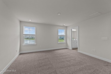 You will not want to miss this one. Located in one of Moyock's on Eagle Creek Golf Club and Grill in North Carolina - for sale on GolfHomes.com, golf home, golf lot
