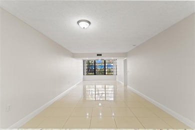 Beautiful 2-bedroom, 2-bathroom condo with a versatile bonus on Pine Island Ridge Country Club in Florida - for sale on GolfHomes.com, golf home, golf lot