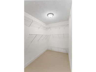 Beautiful 2-bedroom, 2-bathroom condo with a versatile bonus on Pine Island Ridge Country Club in Florida - for sale on GolfHomes.com, golf home, golf lot