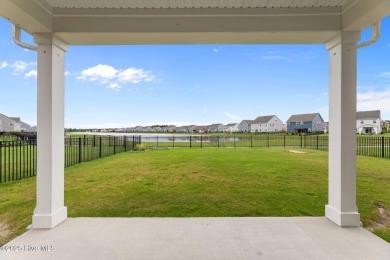 You will not want to miss this one. Located in one of Moyock's on Eagle Creek Golf Club and Grill in North Carolina - for sale on GolfHomes.com, golf home, golf lot