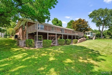 Discover your dream home at this stunning waterfront oasis on Tamarack Country Club in Illinois - for sale on GolfHomes.com, golf home, golf lot