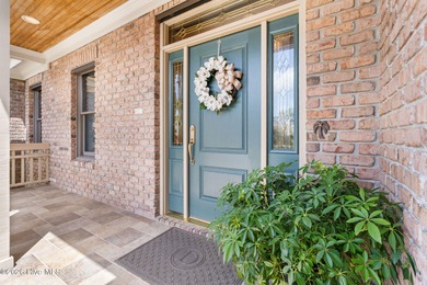 This custom-built all brick home is beautifully positioned along on Members Club At St. James Plantation in North Carolina - for sale on GolfHomes.com, golf home, golf lot