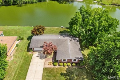 Discover your dream home at this stunning waterfront oasis on Tamarack Country Club in Illinois - for sale on GolfHomes.com, golf home, golf lot