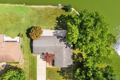 Discover your dream home at this stunning waterfront oasis on Tamarack Country Club in Illinois - for sale on GolfHomes.com, golf home, golf lot