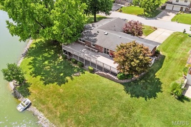 Discover your dream home at this stunning waterfront oasis on Tamarack Country Club in Illinois - for sale on GolfHomes.com, golf home, golf lot