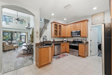 This beautifully maintained 3-bedroom home offers a desirable on Largo Golf Course in Florida - for sale on GolfHomes.com, golf home, golf lot