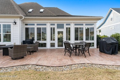 Modern luxury meets serene golf-course living in this immaculate on Members Club At St. James Plantation in North Carolina - for sale on GolfHomes.com, golf home, golf lot