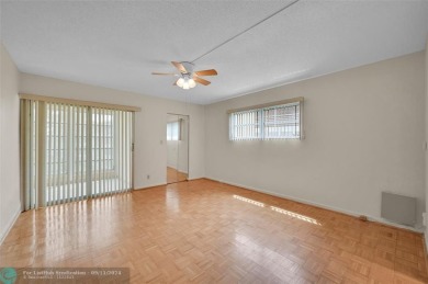 *CORNER UNIT* with a *WATER VIEW***MOTIVATED SELLER*** Parquet on Wynmoor Golf Course in Florida - for sale on GolfHomes.com, golf home, golf lot