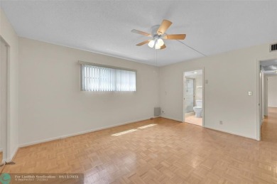 *CORNER UNIT* with a *WATER VIEW***MOTIVATED SELLER*** Parquet on Wynmoor Golf Course in Florida - for sale on GolfHomes.com, golf home, golf lot