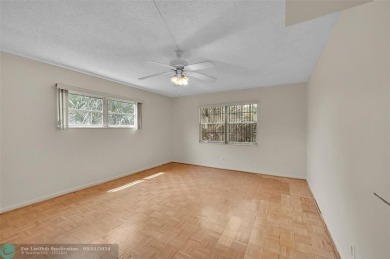 *CORNER UNIT* with a *WATER VIEW***MOTIVATED SELLER*** Parquet on Wynmoor Golf Course in Florida - for sale on GolfHomes.com, golf home, golf lot