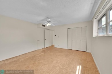 *CORNER UNIT* with a *WATER VIEW***MOTIVATED SELLER*** Parquet on Wynmoor Golf Course in Florida - for sale on GolfHomes.com, golf home, golf lot