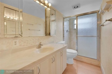 *CORNER UNIT* with a *WATER VIEW***MOTIVATED SELLER*** Parquet on Wynmoor Golf Course in Florida - for sale on GolfHomes.com, golf home, golf lot