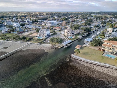 For buyers searching nationwide for true Florida waterfront with on Tiger Point Golf and Country Club in Florida - for sale on GolfHomes.com, golf home, golf lot