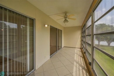 *CORNER UNIT* with a *WATER VIEW***MOTIVATED SELLER*** Parquet on Wynmoor Golf Course in Florida - for sale on GolfHomes.com, golf home, golf lot