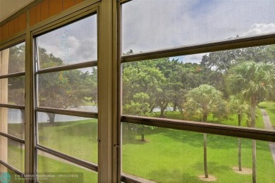 *CORNER UNIT* with a *WATER VIEW***MOTIVATED SELLER*** Parquet on Wynmoor Golf Course in Florida - for sale on GolfHomes.com, golf home, golf lot