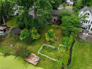 Look no further than this exceptional brick and wood ranch home on Turkeyfoot Lake Golf Links in Ohio - for sale on GolfHomes.com, golf home, golf lot