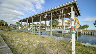 For buyers searching nationwide for true Florida waterfront with on Tiger Point Golf and Country Club in Florida - for sale on GolfHomes.com, golf home, golf lot