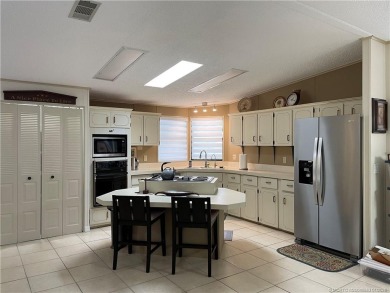 This 2 BR/2 bath home has so much to offer! Furnished, designer on Indianwood Golf and Country Club in Florida - for sale on GolfHomes.com, golf home, golf lot