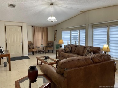 This 2 BR/2 bath home has so much to offer! Furnished, designer on Indianwood Golf and Country Club in Florida - for sale on GolfHomes.com, golf home, golf lot