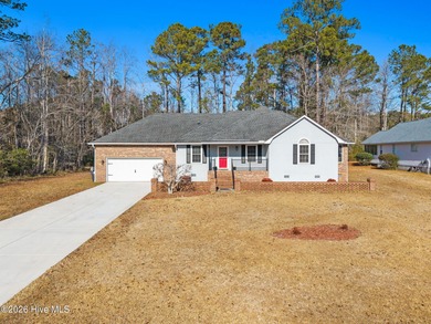 This charming brick home is tucked into an established on Brierwood Golf Club in North Carolina - for sale on GolfHomes.com, golf home, golf lot