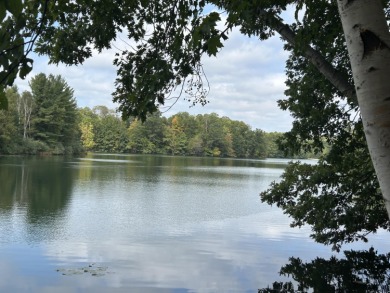 Waterfront Lot on Lake of the Clouds in Canadian Lakes!! on Canadian Lakes Country Club-The Highlands Course in Michigan - for sale on GolfHomes.com, golf home, golf lot