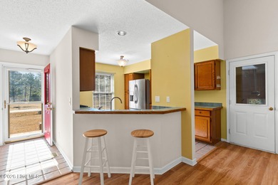 This charming brick home is tucked into an established on Brierwood Golf Club in North Carolina - for sale on GolfHomes.com, golf home, golf lot