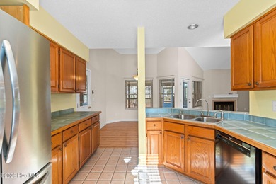 This charming brick home is tucked into an established on Brierwood Golf Club in North Carolina - for sale on GolfHomes.com, golf home, golf lot