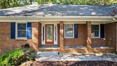 Located in the sought-after Pine Ridge Country Club Estates on Collins Hill Golf Club in Georgia - for sale on GolfHomes.com, golf home, golf lot