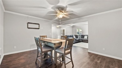 Located in the sought-after Pine Ridge Country Club Estates on Collins Hill Golf Club in Georgia - for sale on GolfHomes.com, golf home, golf lot