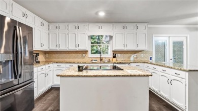 Located in the sought-after Pine Ridge Country Club Estates on Collins Hill Golf Club in Georgia - for sale on GolfHomes.com, golf home, golf lot