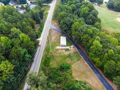 FULLY RENOVATED COMMERCIAL PROPERTY PERFECT FOR A MEDICAL on Sugar Hill Golf Club in Georgia - for sale on GolfHomes.com, golf home, golf lot