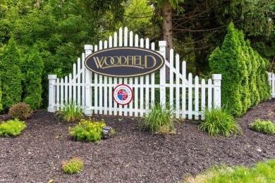 ** This 4 bedroom split level, 3.5 bath home is not only in on The Captains Club At Woodfield in Michigan - for sale on GolfHomes.com, golf home, golf lot