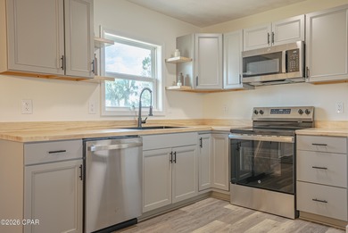 Completely Remodeled & Perfectly Located in Lynn Haven! Welcome on Panama Country Club in Florida - for sale on GolfHomes.com, golf home, golf lot