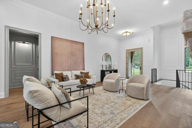 Welcome to your dream home, where timeless European charm meets on Reynolds Lake Oconee - The Landing in Georgia - for sale on GolfHomes.com, golf home, golf lot