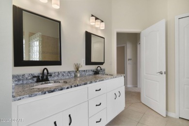 Located in the prestigious gated Spruce Creek Fly-In community on Spruce Creek Golf Club in Florida - for sale on GolfHomes.com, golf home, golf lot