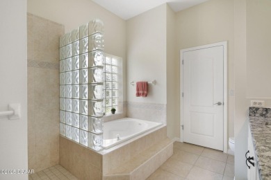 Located in the prestigious gated Spruce Creek Fly-In community on Spruce Creek Golf Club in Florida - for sale on GolfHomes.com, golf home, golf lot