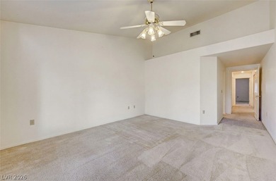 Set against sweeping mountain and golf course views, this on Highland Falls Golf Club in Nevada - for sale on GolfHomes.com, golf home, golf lot