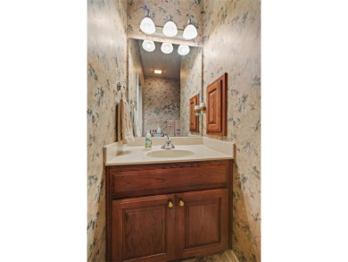 Stunning home that is handicap accessible in a rare much desired on Bella Vista - Metfield Golf Complex and Country Club in Arkansas - for sale on GolfHomes.com, golf home, golf lot