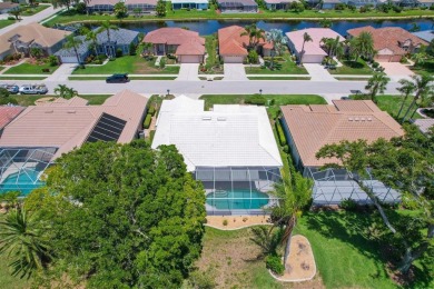 SPACIOUS OPEN VIEWS OF POOL, YARD, TREES, GOLF COURSE and LAKE on Pelican Pointe Golf and Country Club in Florida - for sale on GolfHomes.com, golf home, golf lot