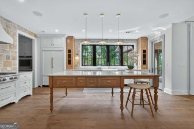 Welcome to your dream home, where timeless European charm meets on Reynolds Lake Oconee - The Landing in Georgia - for sale on GolfHomes.com, golf home, golf lot