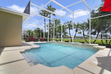 Located in the prestigious gated Spruce Creek Fly-In community on Spruce Creek Golf Club in Florida - for sale on GolfHomes.com, golf home, golf lot