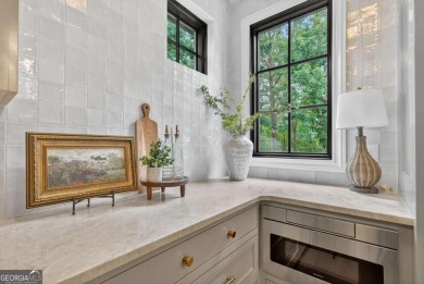 Welcome to your dream home, where timeless European charm meets on Reynolds Lake Oconee - The Landing in Georgia - for sale on GolfHomes.com, golf home, golf lot